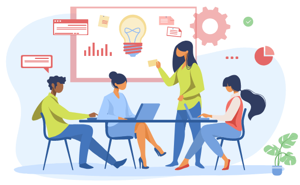 business team members sitting at a table discussing